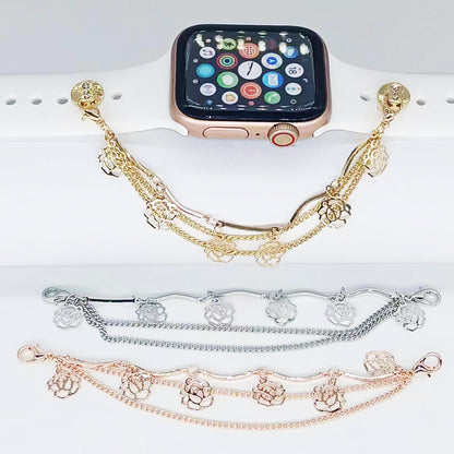 Smartwatch with decorative gold, silver, and rose gold watch bands on a white background