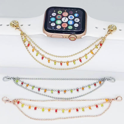 Smartwatch with colorful chain strap on a white stand