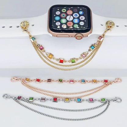 Smartwatch with colorful gemstone watch bands on a white stand