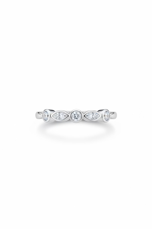 A silver band ring with a row of small clear gemstones 