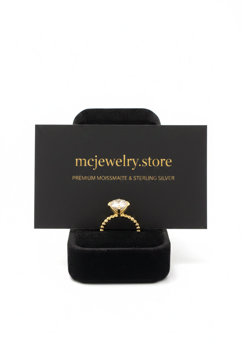 Business card and ring dispayed on box  in shop 