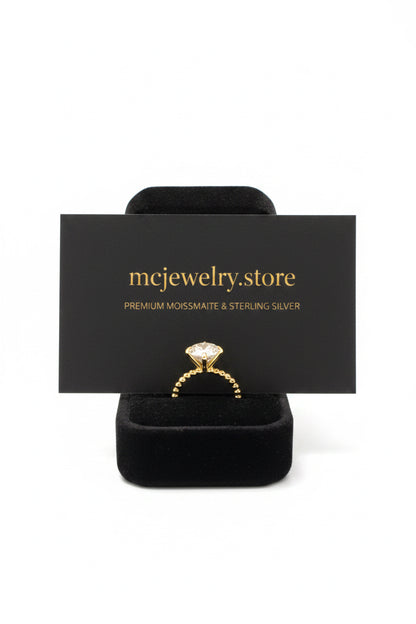 Business card and ring dispayed on box  in shop 