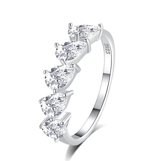 A silver-tone diamond ring featuring five pear-cut clear stones set in a polished band, shown on a clean white background.