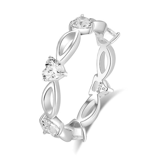 A silver infinity-style ring featuring four clear heart-shaped and oval gemstones, shown on a clean white background with a soft shadow.