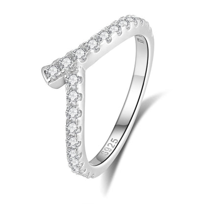 Silver lining ring with diamond accents on a white background