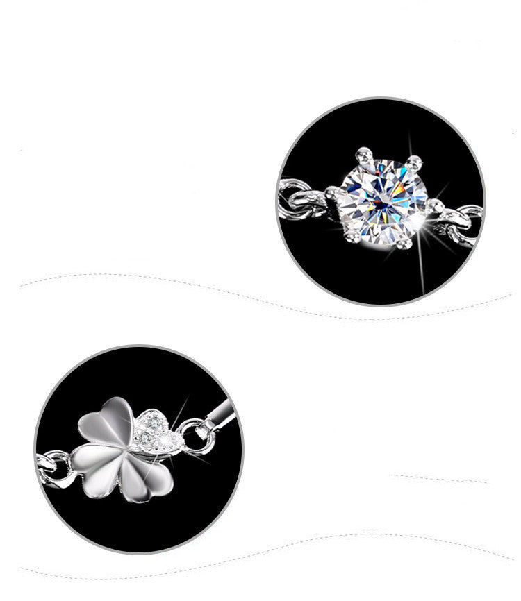 Two silver pendants on a white background
