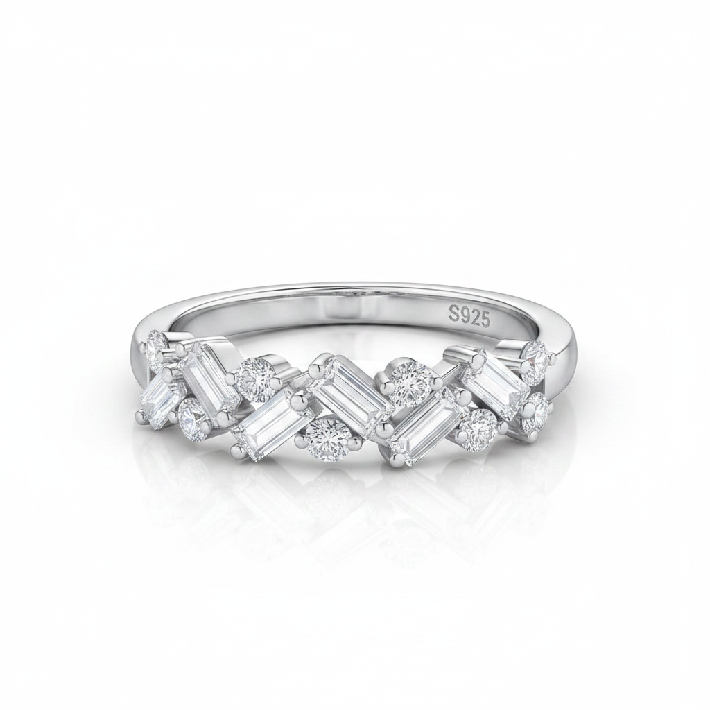 Silver ring with diamond accents on a white background
