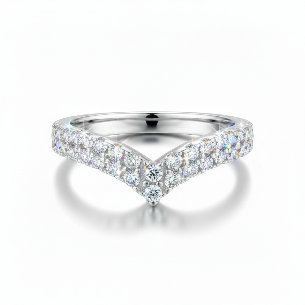 Silver ring with diamond accents on a white background