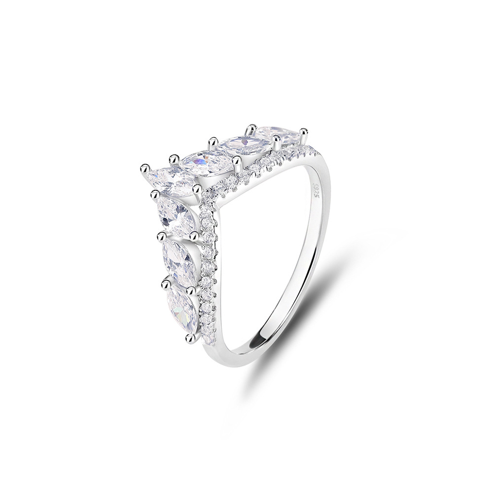 Silver ring with multiple gemstones on a white background